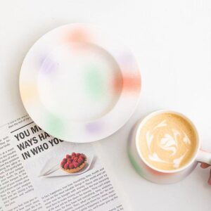 Colorful coffee cup and saucer set